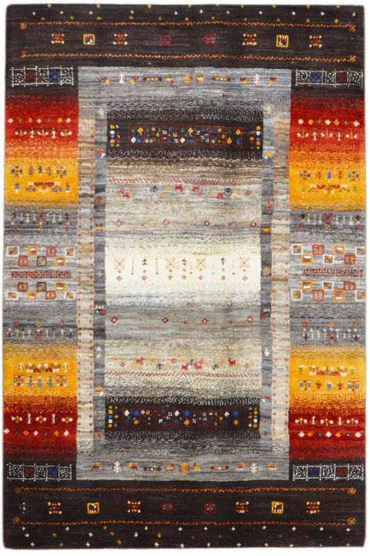 Rug with a symmetrical medallion, central area accented in light gray, red, and yellow