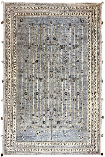 Rug with a blue-gray background, golden-beige chain ornaments, a beige border, and tassels