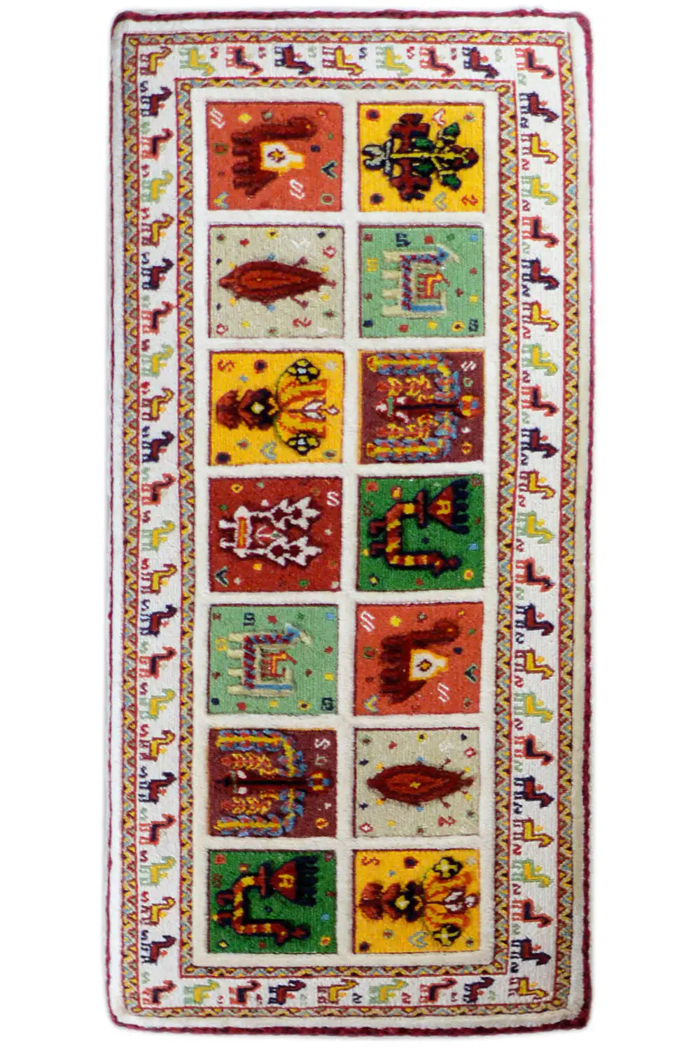 Long rectangular Soumak rug: white background with colorful patterned squares and decorative border