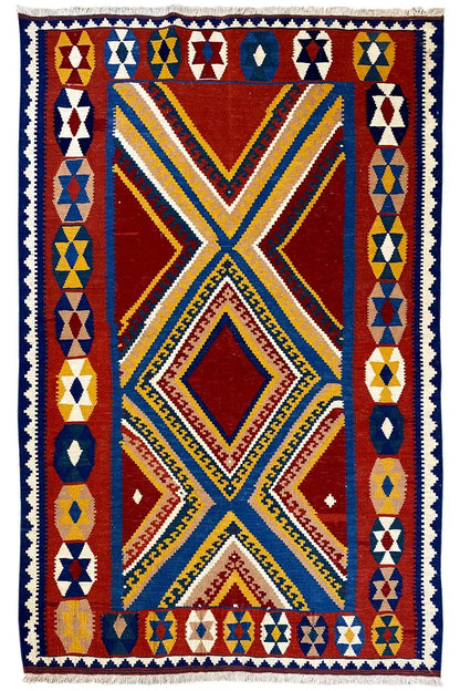 Square kilim rug with a red X motif framed by geometric triangles