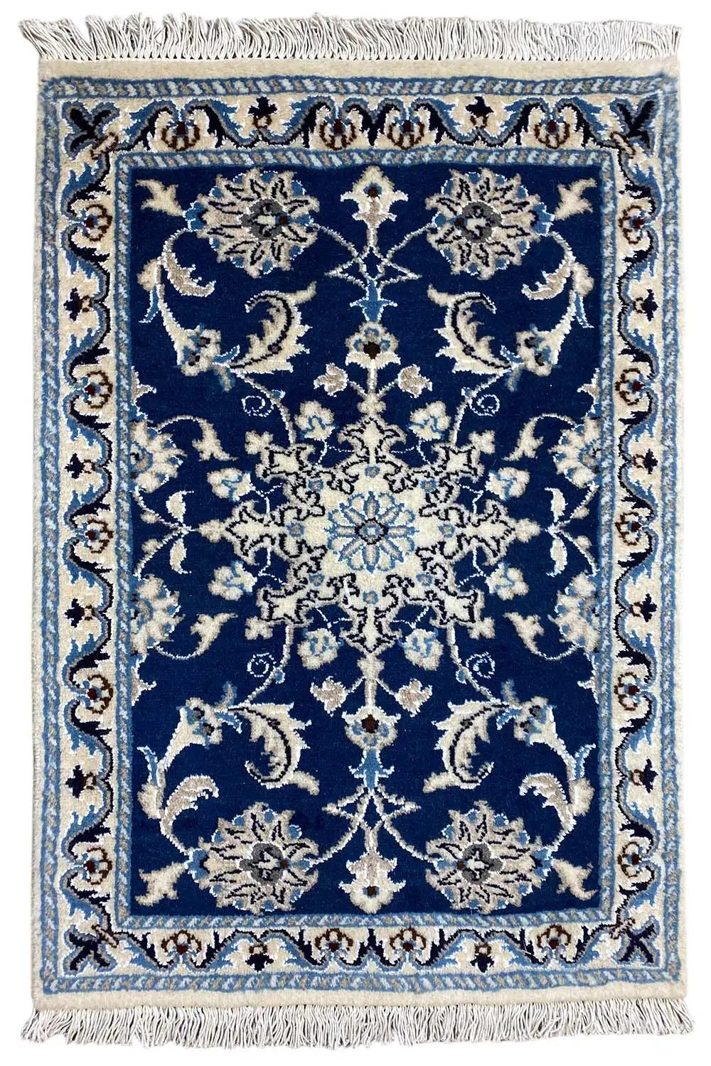 Oriental rug 84x58 cm with blue-and-white ornamentation, fringes along the edges