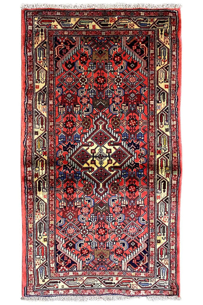 Hamadan rug 135x77 cm front: red central ornament with dark blue and a light border