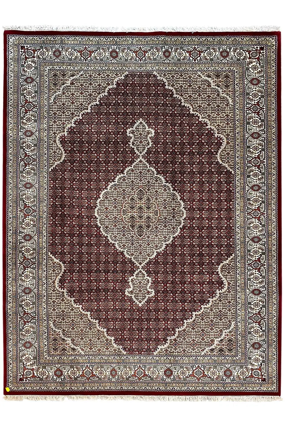 Indo-Tabriz rug with a square center, dark reddish-brown field, and beige border