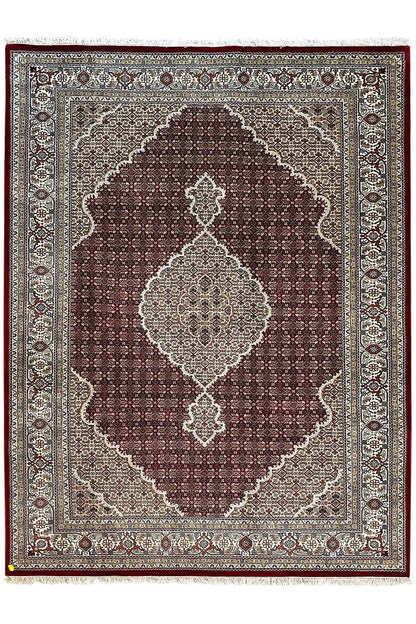 Indo-Tabriz rug with a square center, dark reddish-brown field, and beige border