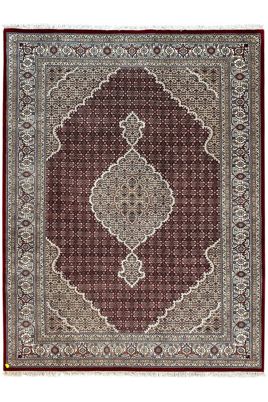 Indo-Tabriz rug with a square center, dark reddish-brown field, and beige border