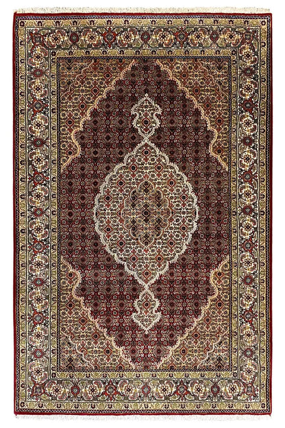Indo Tabriz rug with a square medallion and ornamental border, dark red/brown