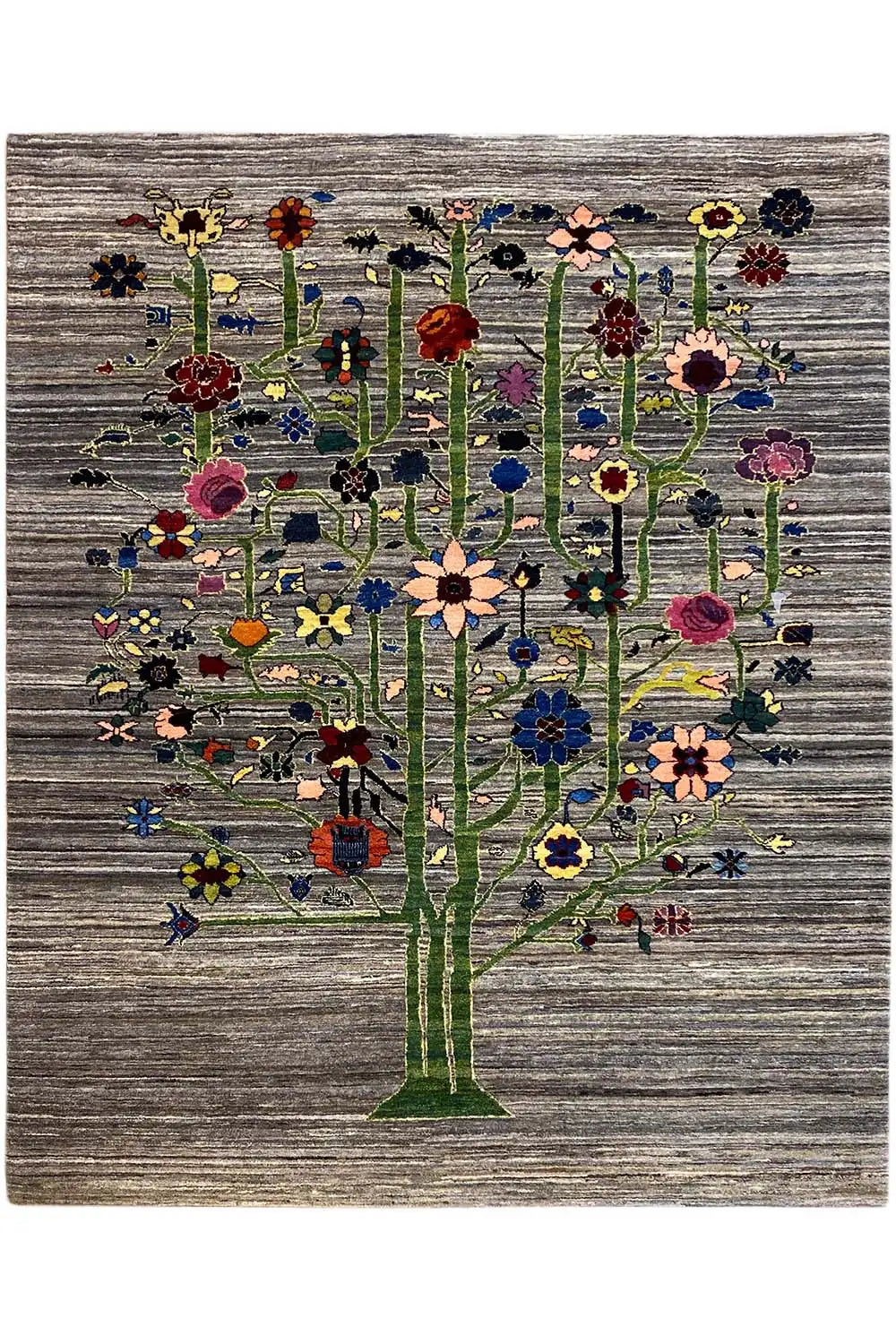 Gabbeh-Lori rug with tree motifs in vibrant colors on a gray background