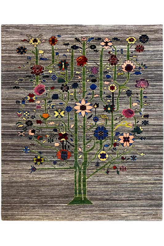 Gabbeh-Lori rug with tree motifs in vibrant colors on a gray background