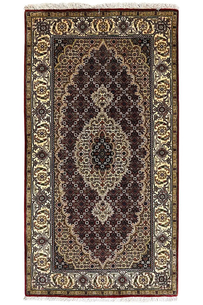 Indo Tabriz rug (145x76 cm), rectangular, dark medallion pattern with a gold border