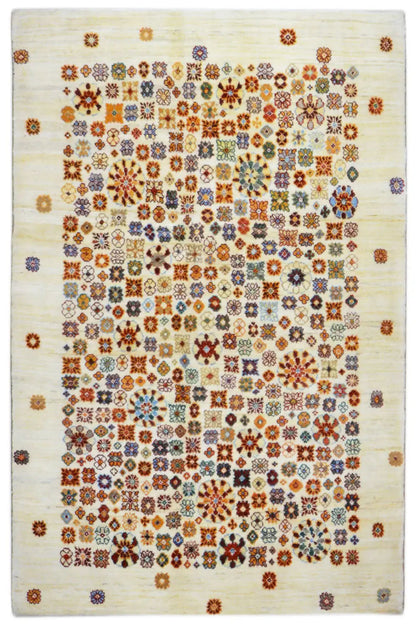 Rectangular rug with a delicate, colorful grid and floral pattern on a cream background