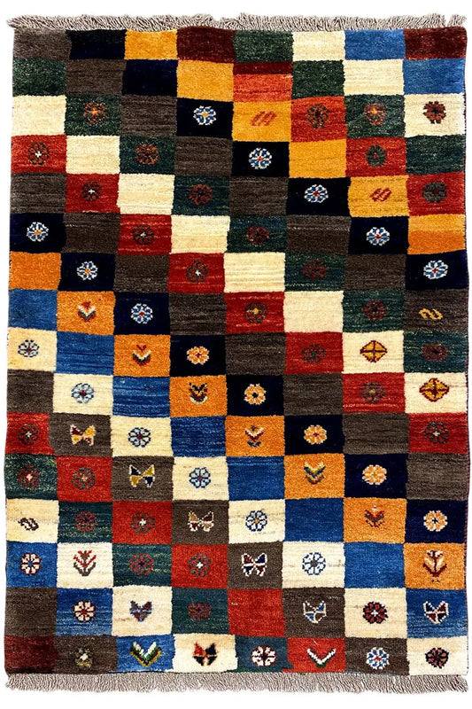 Gabbeh Lori rug with square color fields and small ornaments, with fringes on both sides