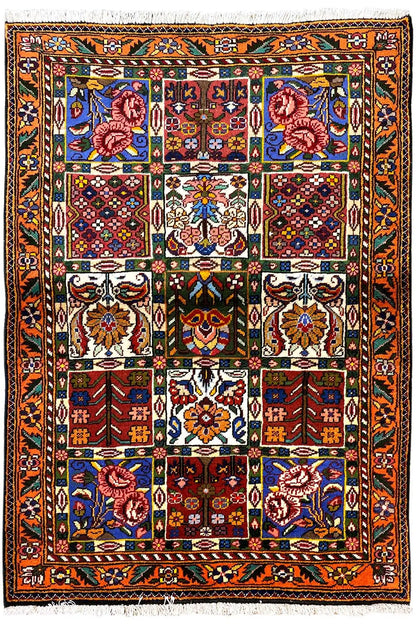 Bakhtiari rug (145x105 cm) full view with an orange border and medallion pattern