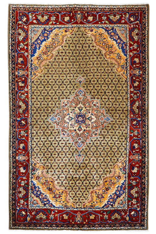 Hamadan rug, front view: red floral border, central ornament in beige with blue and red
