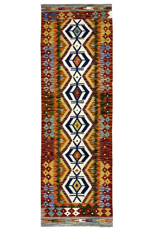 Afghan kilim runner with a multicolored geometric pattern, fringes on the sides