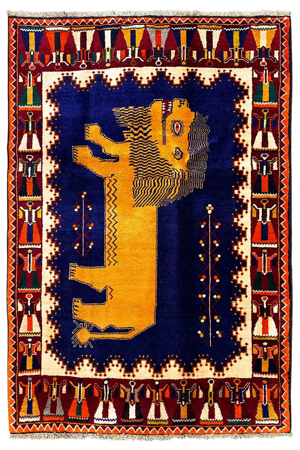 Gabbeh rug with a lion motif, dark blue center, and red border with decorative bands