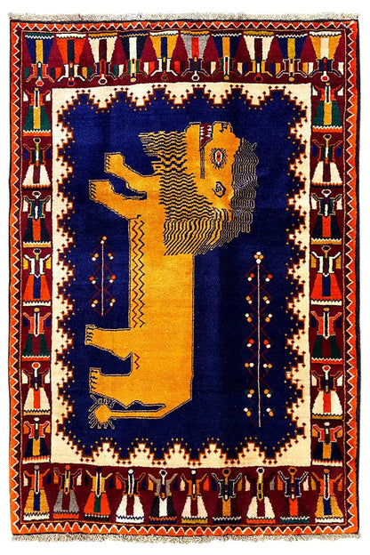 Gabbeh rug with a lion motif, dark blue center, and red border with decorative bands