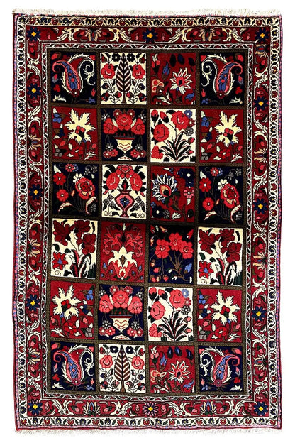 Bakhtiari rug (157x106 cm) with a patchwork pattern in red, black, and cream