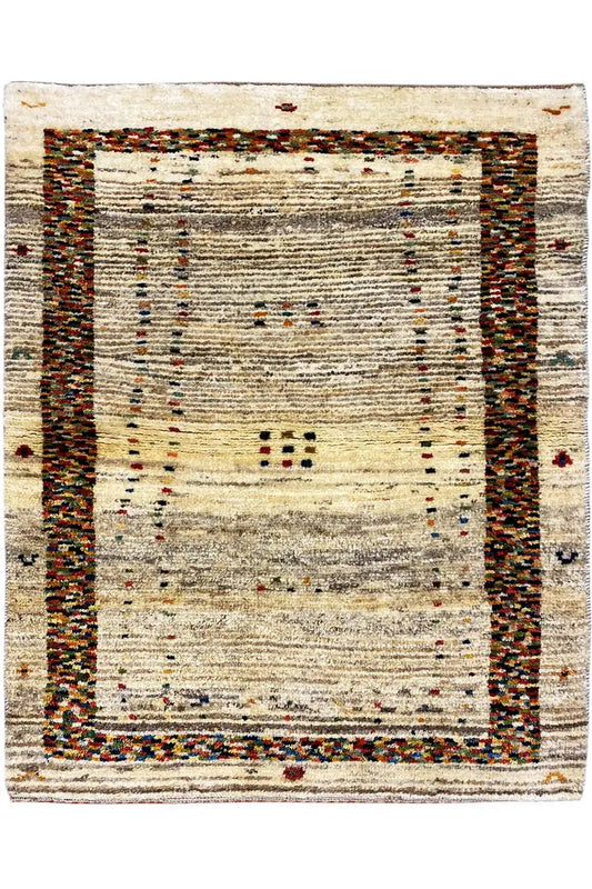 Gabbeh rug with a border pattern in beige, brown, and accent colors