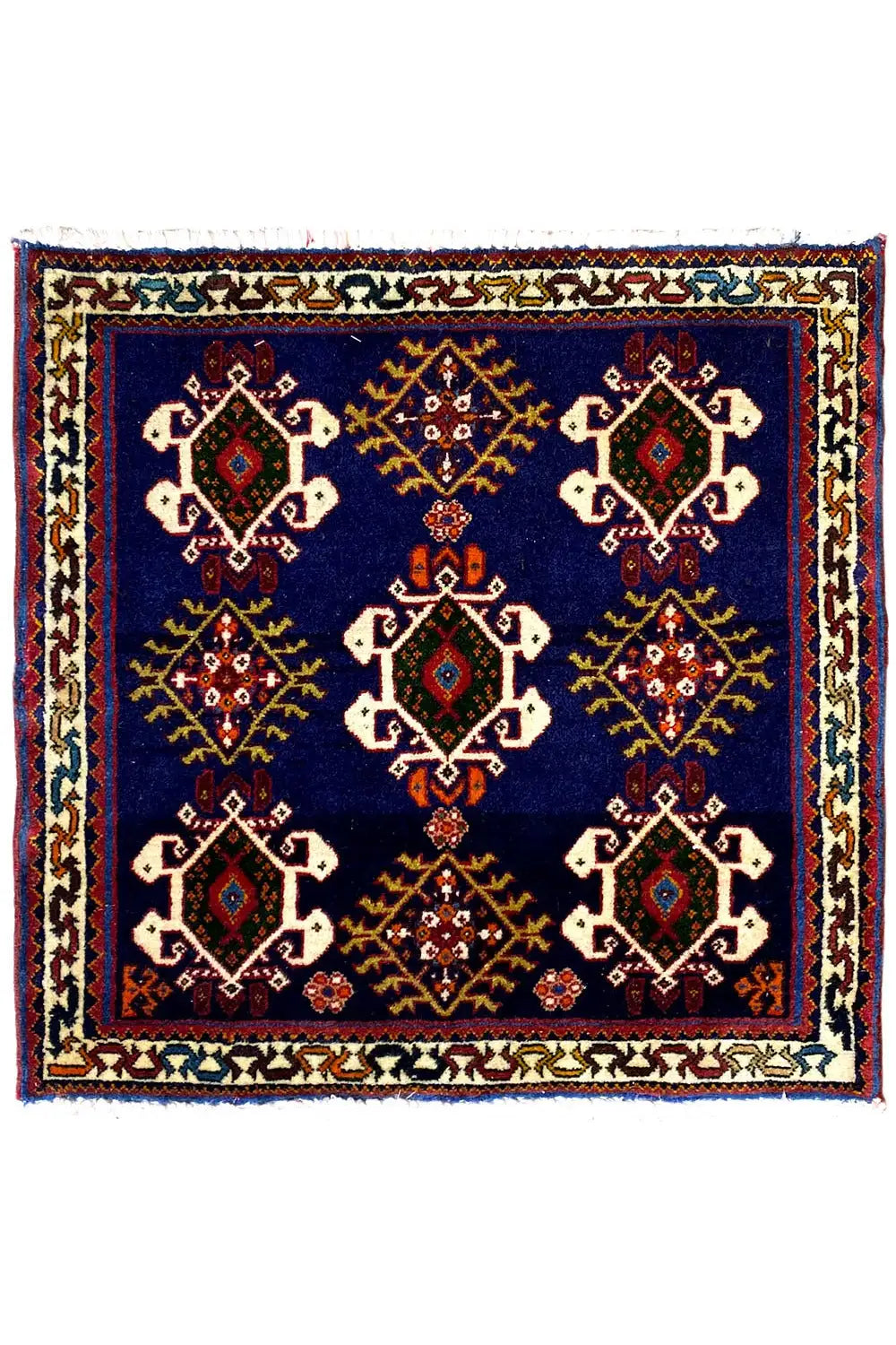 Rug 61x60 cm with dark blue background and symmetrical diamond design