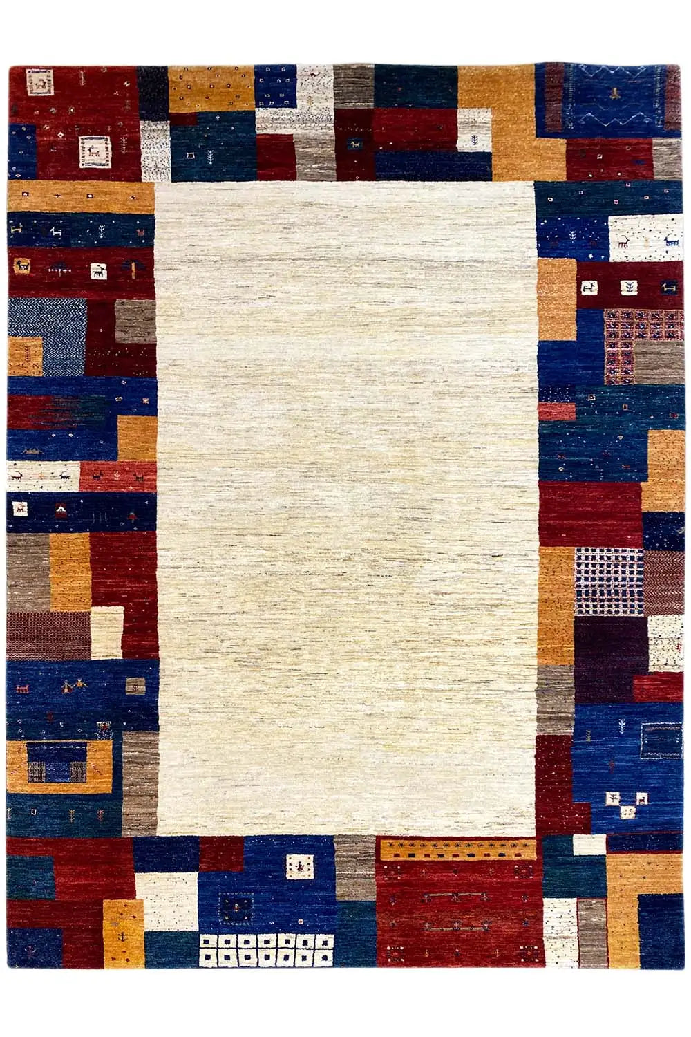 Gabbeh rug with a white center, patchwork of blue, red, and yellow blocks