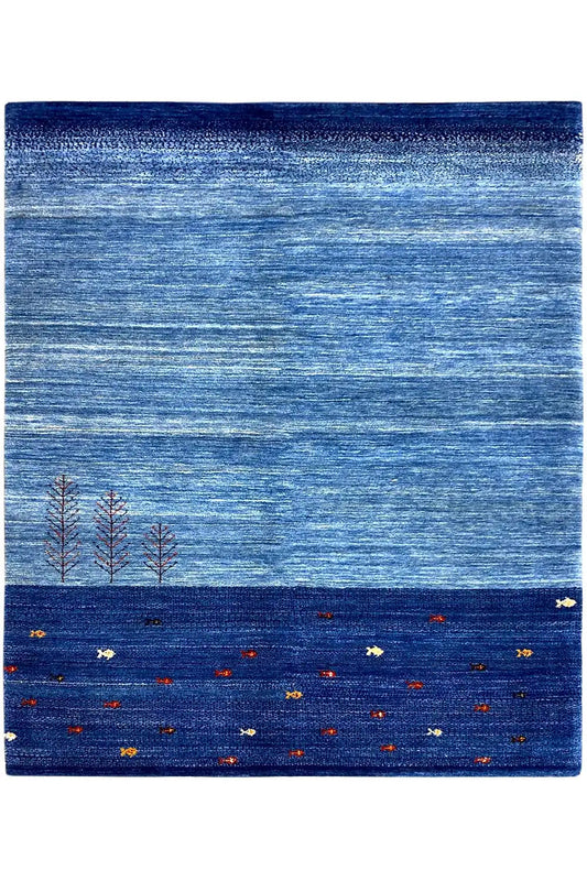 Blue Lori Gabbeh rug with a dark border and tree/dot motifs, 193x150 cm