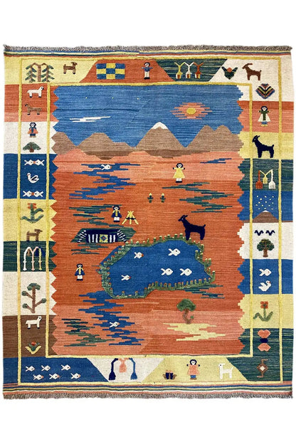 Blue and rust-red kilim rug with a landscape design, framed border with symbols