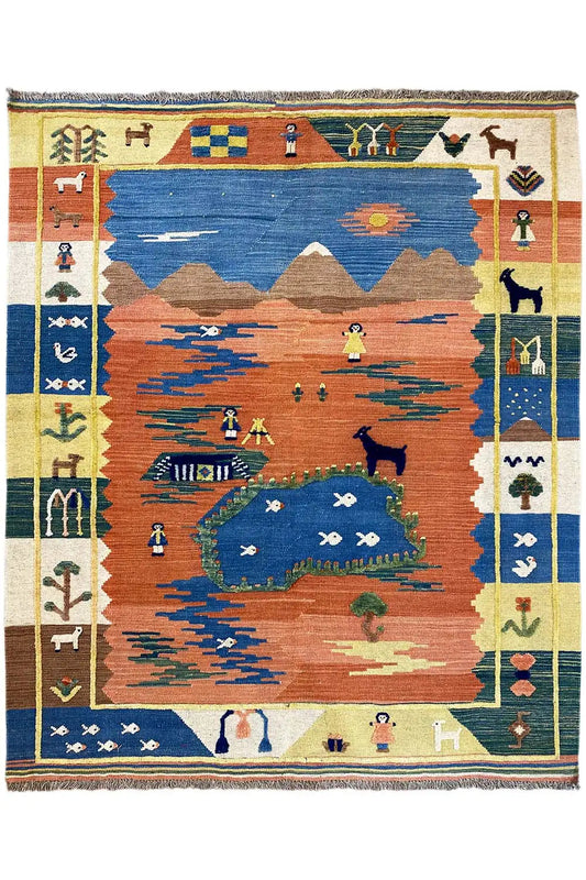 Blue and rust-red kilim rug with a landscape design, framed border with symbols
