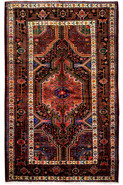 Hamadan rug with a red medallion and geometric border, featuring colorful patterns