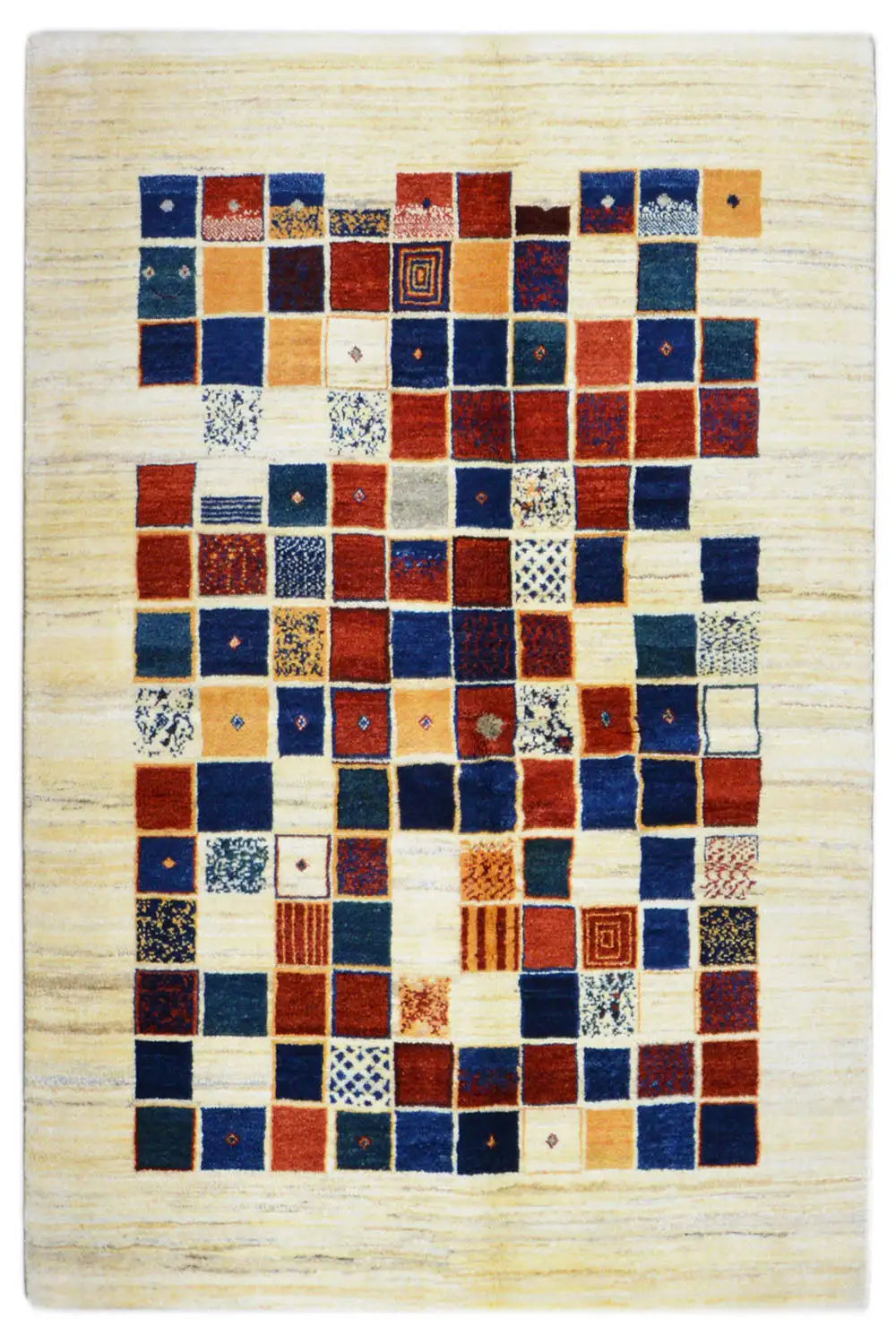 Gabbeh rug with a square patchwork pattern in blue, red, and cream