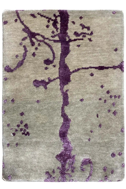 Designer rug with a purple line pattern on a beige background, rectangular