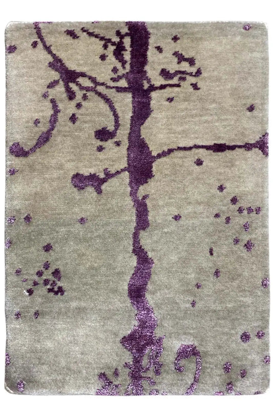 Designer rug with a purple line pattern on a beige background, rectangular