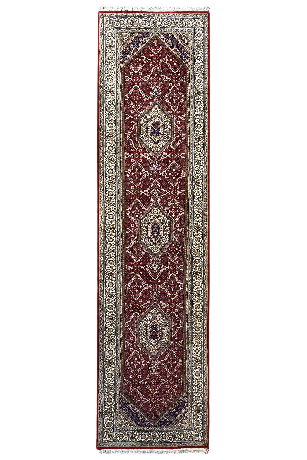 Portrait-oriented Bidjar runner with a red central motif and beige border