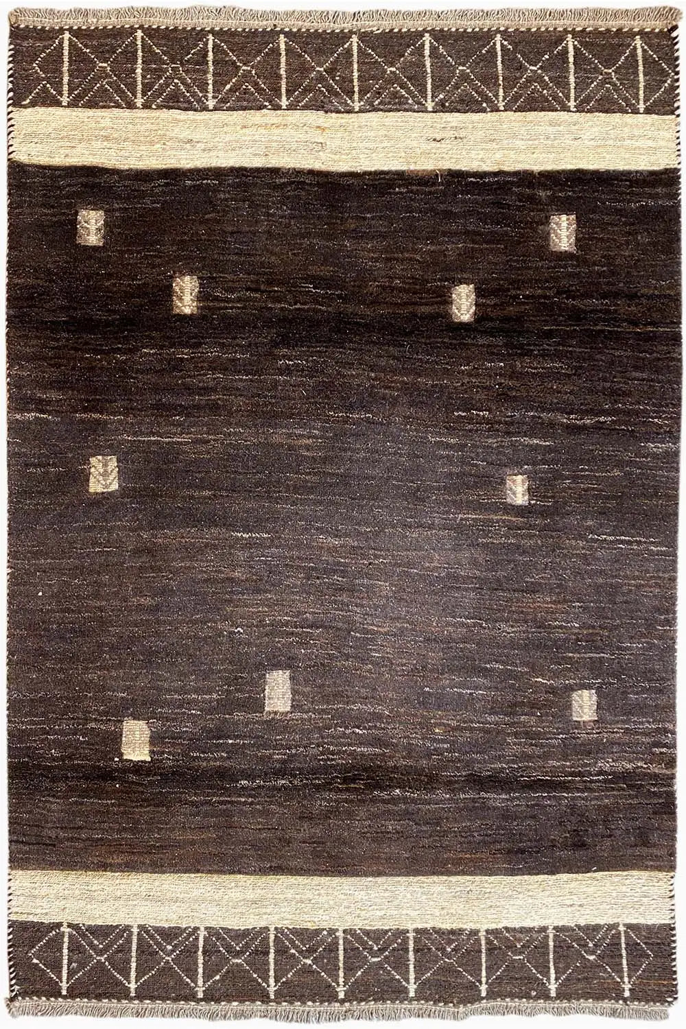 Dark brown Gabbeh rug with light decorative borders, geometric patterns, and fringes