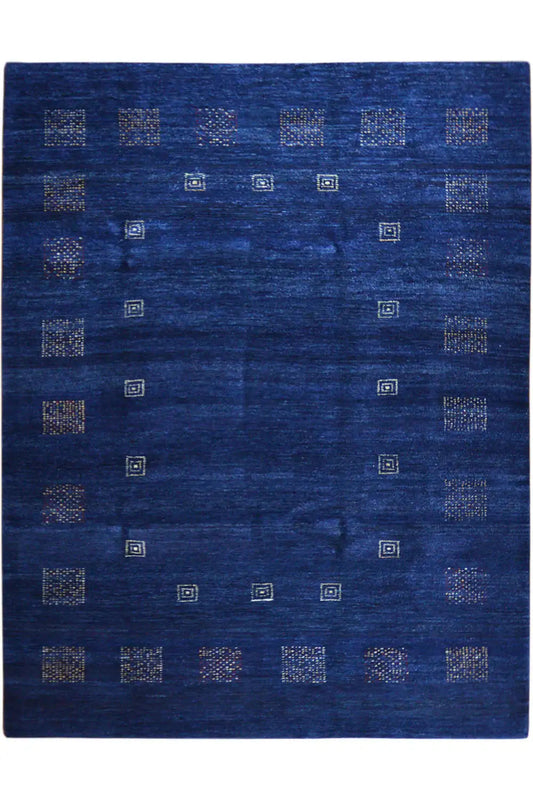 Blue rug with subtle ornaments made of small squares and border patterns