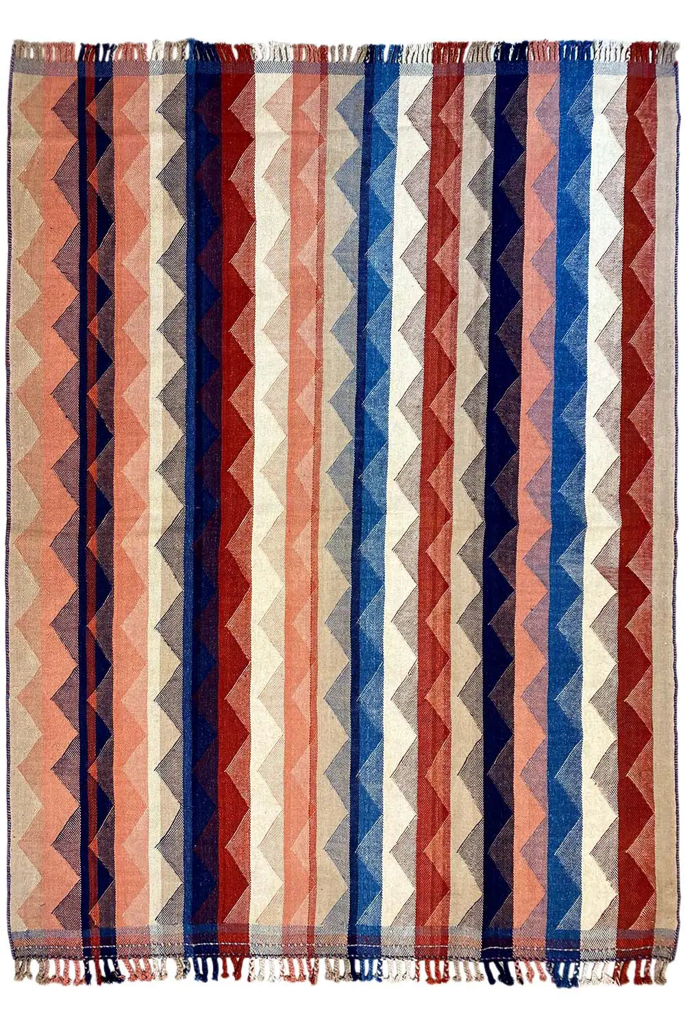 Rectangular Jajim rug with wide zigzag stripes in red, blue, and cream, with fringes.