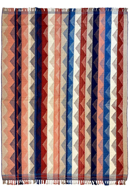 Rectangular Jajim rug with wide zigzag stripes in red, blue, and cream, with fringes.