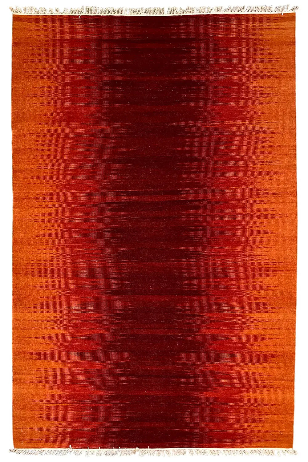 Kilim dhurrie rug in an orange-red gradient, with fringes along the edge