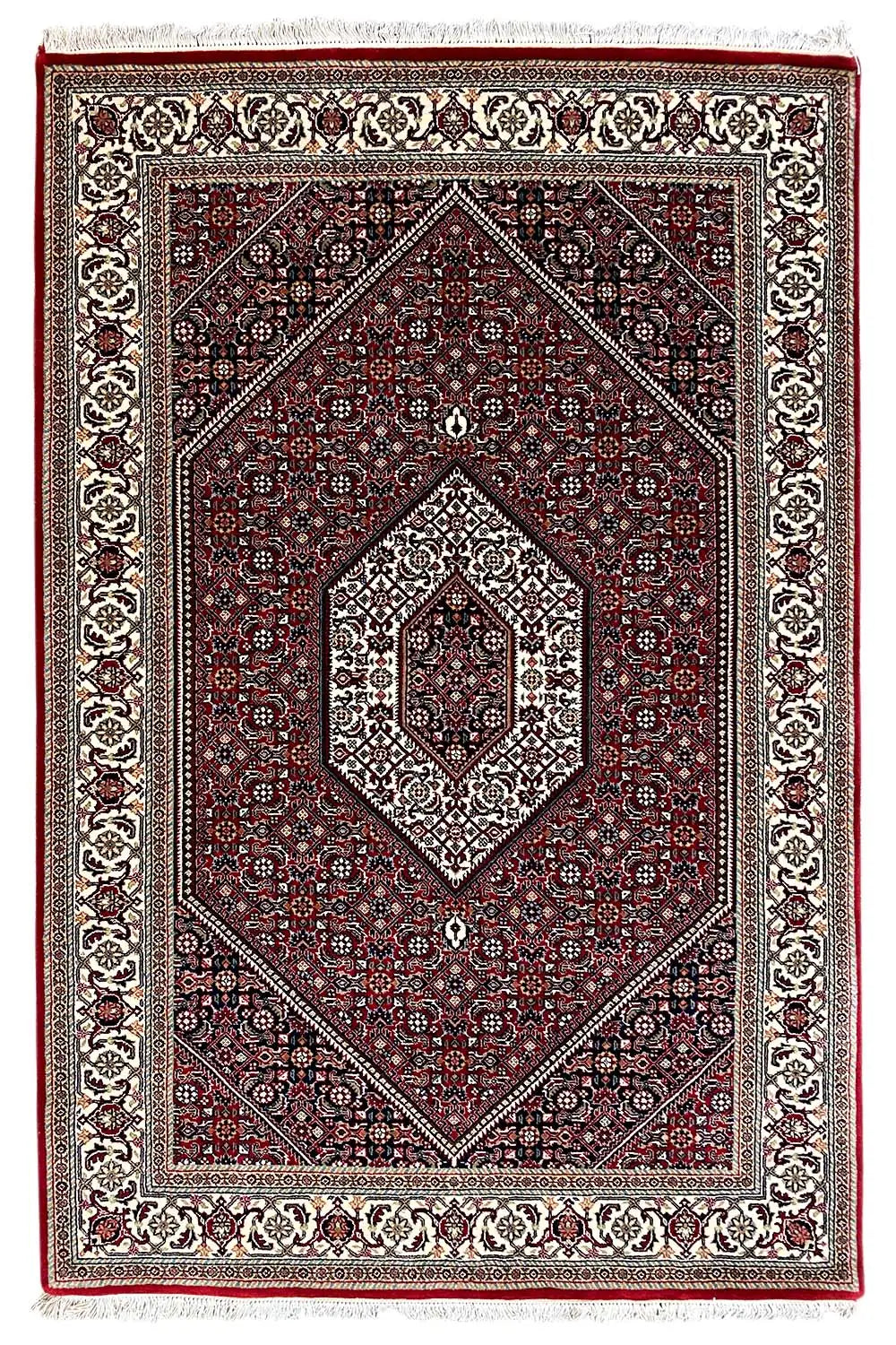 Rectangular Bidjar rug with a red central medallion and white border