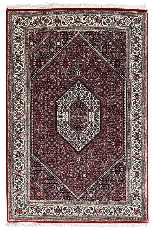 Rectangular Bidjar rug with a red central medallion and white border