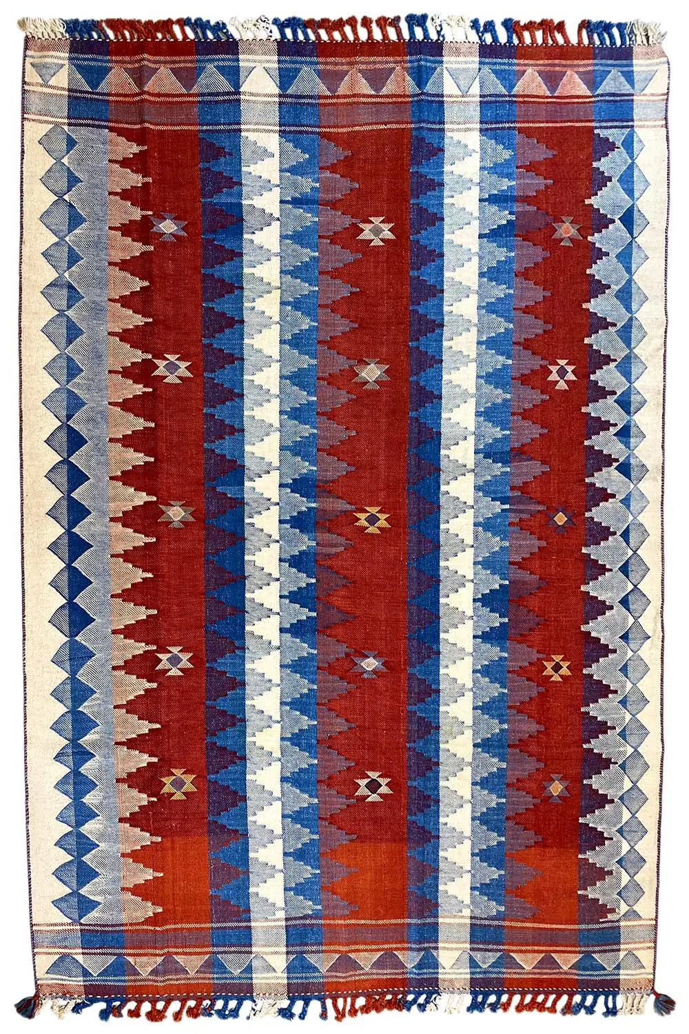Rug with vertical red, blue, and cream stripes, a border around the edge, and fringe