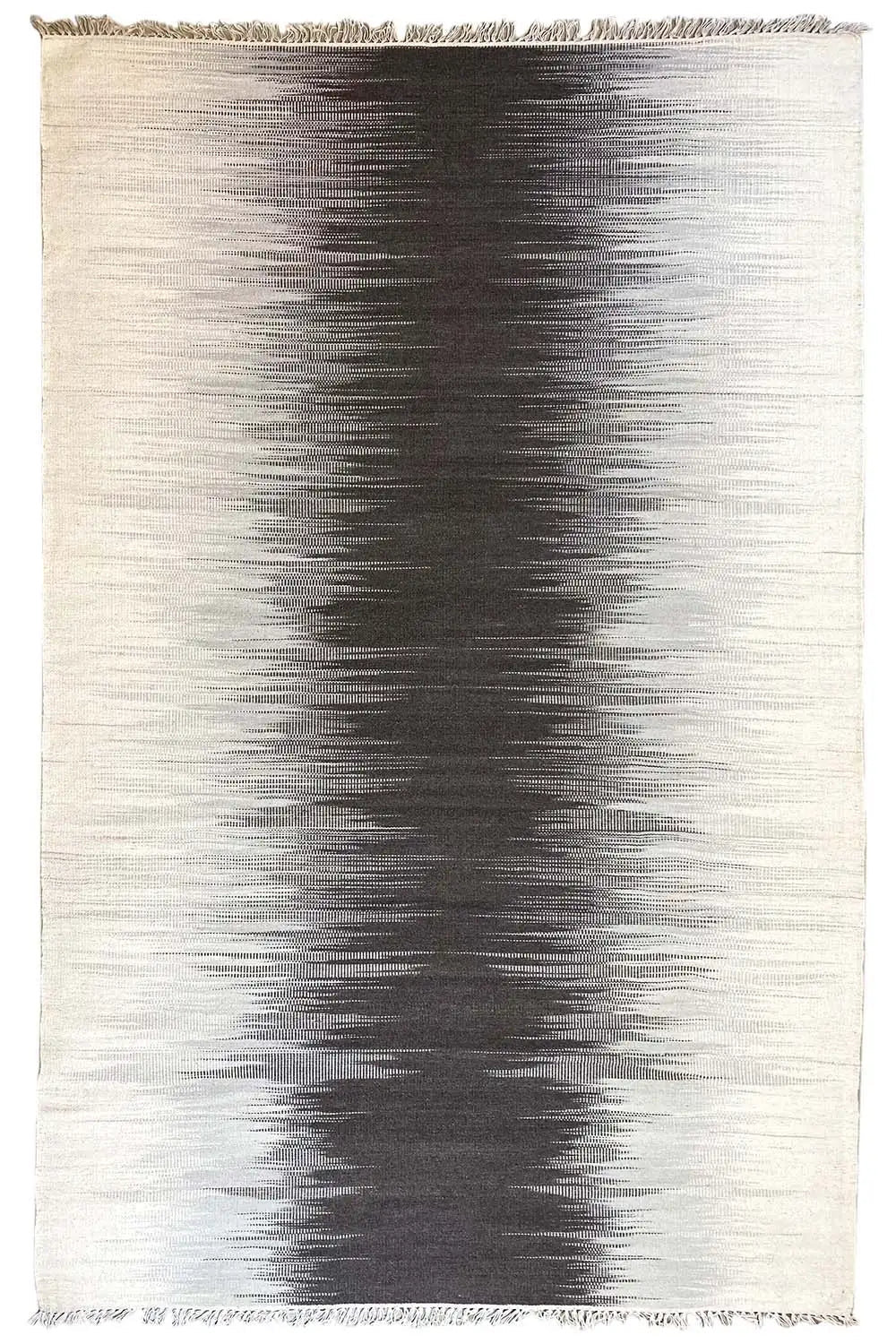 Rectangular gray kilim rug with dark gradient patterns and fringes along the edge