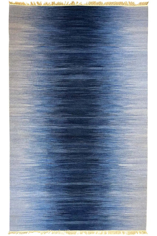 Blue kilim dhurrie rug, rectangular, with a gold-colored border and fringes