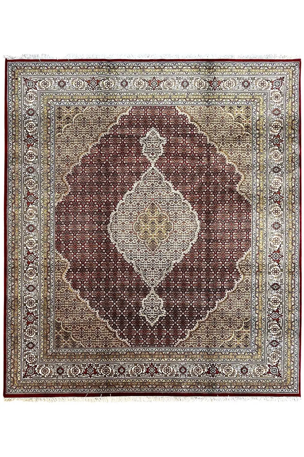 Indo Tabriz rug, central medallion in brown and beige with a fine border pattern