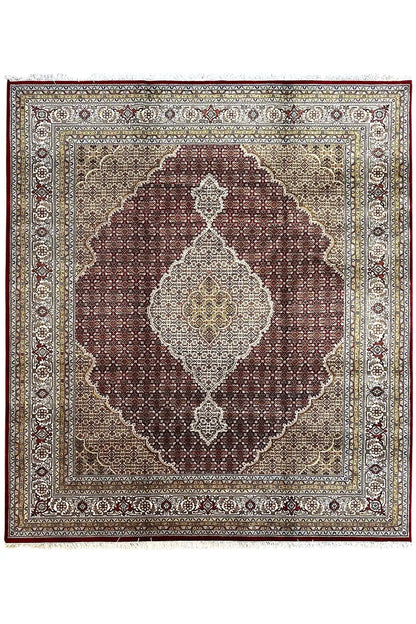 Indo Tabriz rug, central medallion in brown and beige with a fine border pattern