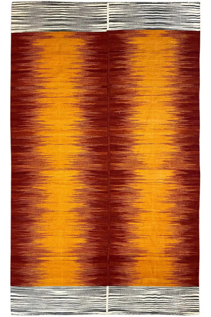 Kilim rug with an orange-yellow and reddish gradient, bordered in gray
