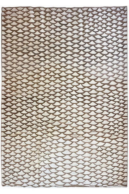 Carpet surface with a dense brown scale pattern on a beige background
