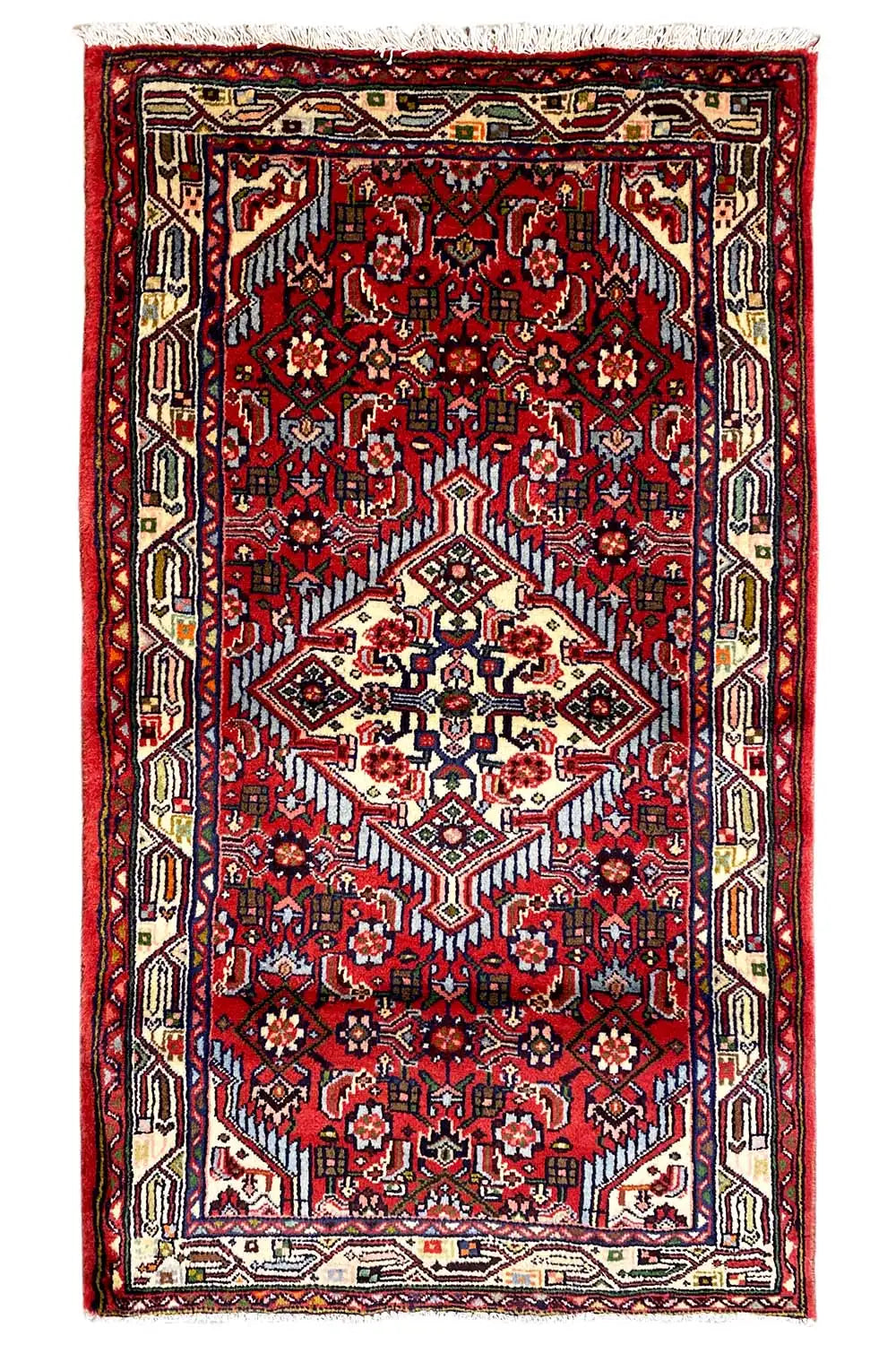 Portrait-format Hamadan rug: red pattern with a cream-colored medallion and border