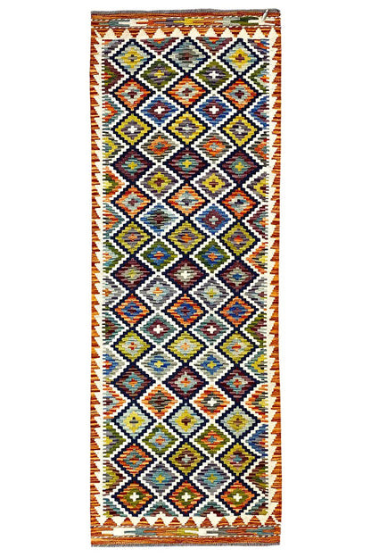 Rectangular kilim runner with a colorful diamond and zigzag pattern