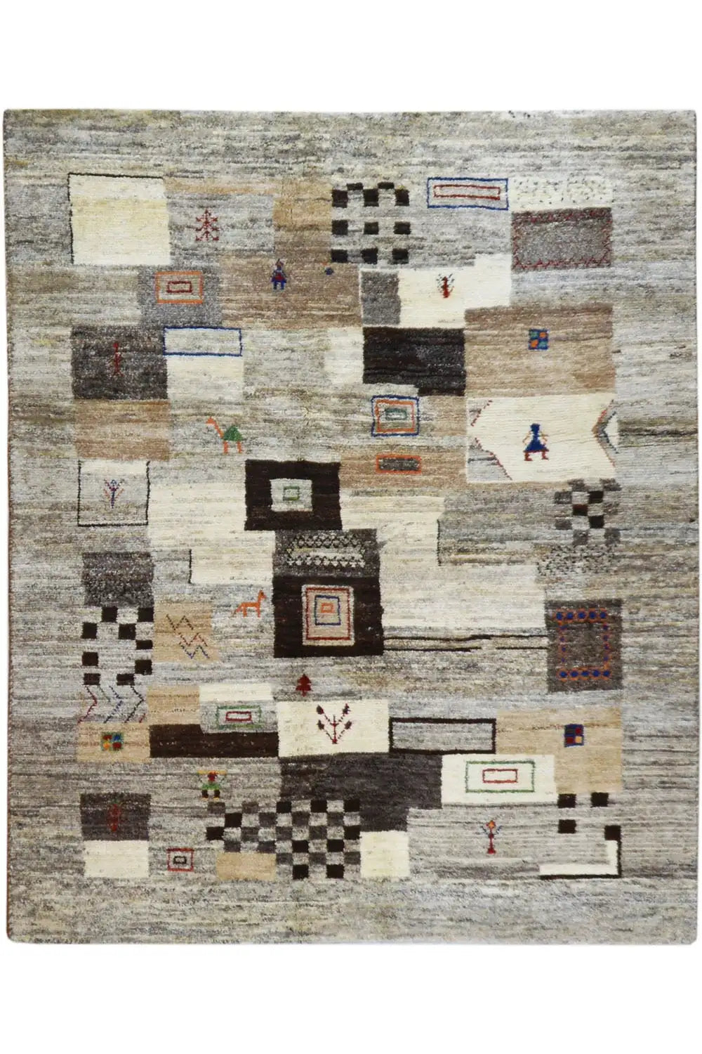 Beige-gray gabbeh rug with patchwork patterns of black rectangles and squares.