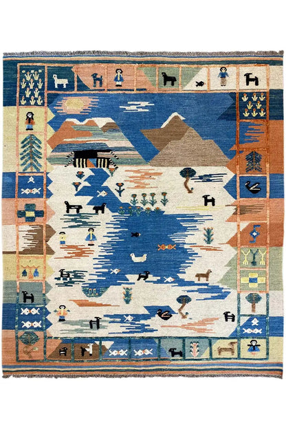 Kilim rug with a large central field and geometric pattern in blue, beige, orange, and green